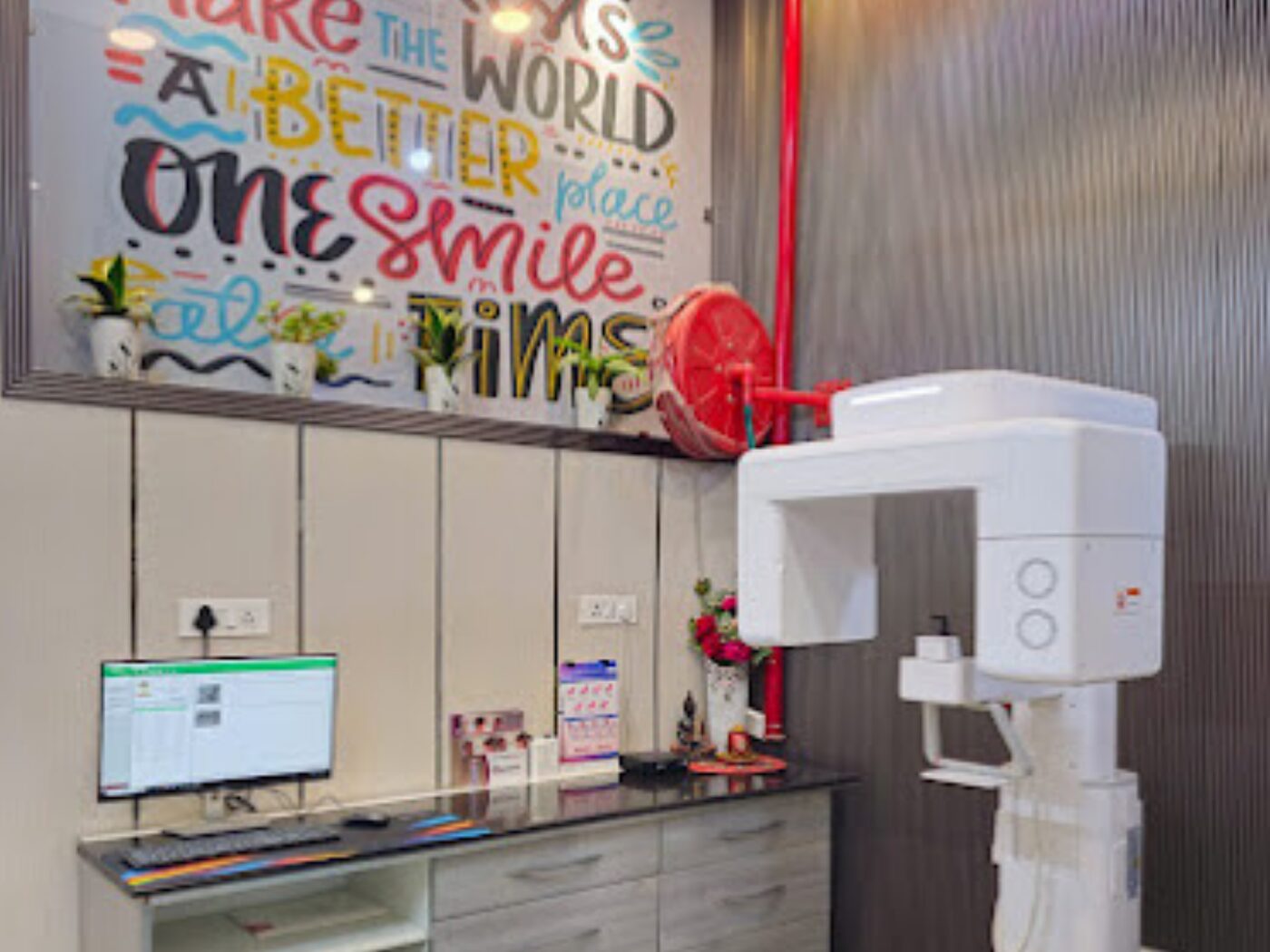 In-house OPG and CBCT imaging unit beside the reception desk